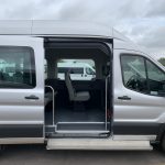 Passenger van door open with foot step