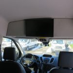 Van with ceiling mounted tv