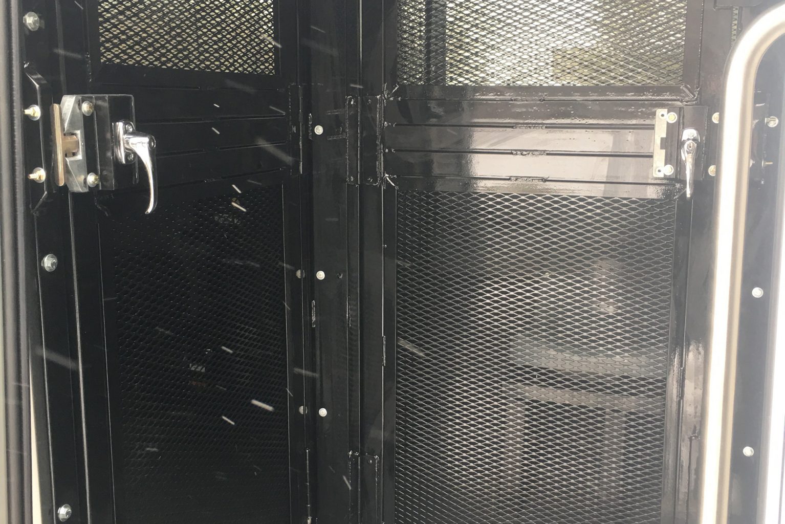 Caged door for Prisoner Transport van